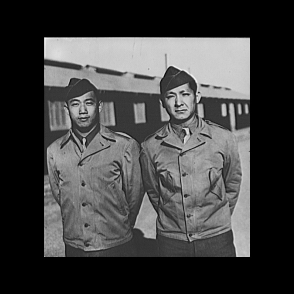 Chinese Americans posing after receiving officer rank at Camp Barkeley, Texas.